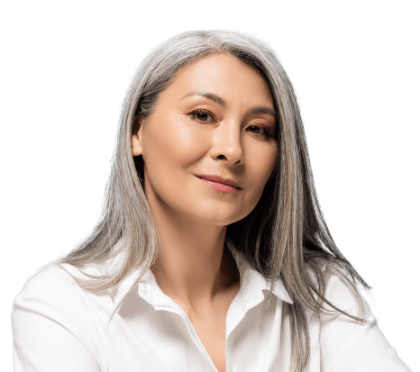 Women investor with long grey hair and wearing a white blouse.